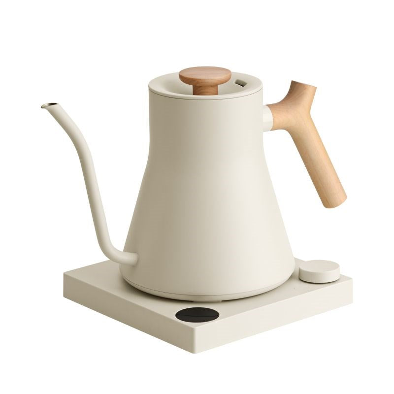Fellow Stagg EKG PRO 900ml electric kettle in sesame beige with a wooden handle