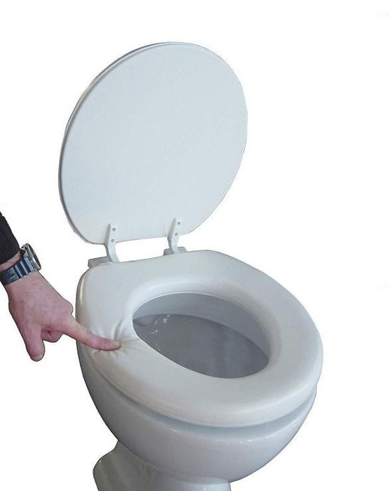 Soft toilet seat with a flap